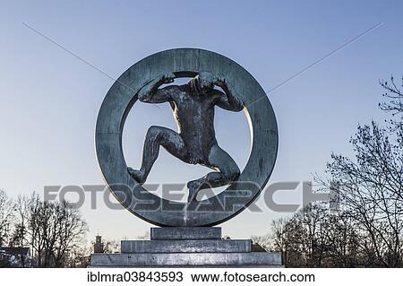 "Bronze sculpture, man struggling in the """"wheel of life"""", Vigeland installation, Frogner Park, Oslo, Norway, Europe" View Large Photo Image Stock Image - "Bronze sculpture, man struggling in the """"wheel of life"""", Vigeland installation, Frogner Park, Oslo, Norway, Europe". Fotosearch