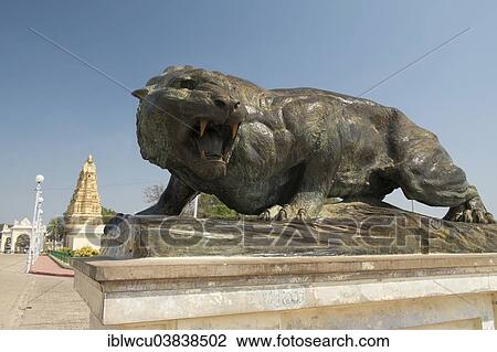 Stock Image - "Bronze sculpture of a jaguar at the Mysore Palace, Mysore, Karnataka, India, Asia". Fotosearch