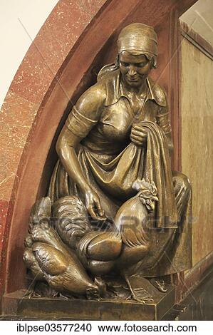 "Bronze statue of a female farmer with cock and hen, Revolution Square metro station, Ploshchad Revolyutsii, Moskau, Moscow Oblast, Russia, Europe" View Large Photo Image Stock Image - "Bronze statue of a female farmer with cock and hen, Revolution Square metro station, Ploshchad Revolyutsii, Moskau, Moscow Oblast, Russia, Europe". Fotosearch