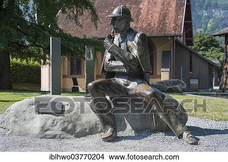 Picture - "Bronze statue of Sherlock Holmes in the city center, Meiringen, Canton of Bern, Switzerland, Europe". Fotosearch