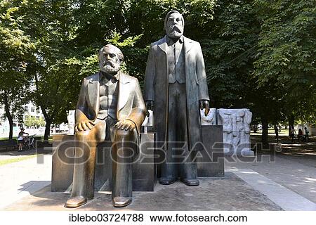 "Bronze statues of Karl Marx and Friedrich Engels, Marx-Engels-Forum, public park, Berlin, Berlin, Germany, Europe" View Large Photo Image Stock Photo - "Bronze statues of Karl Marx and Friedrich Engels, Marx-Engels-Forum, public park, Berlin, Berlin, Germany, Europe". Fotosearch