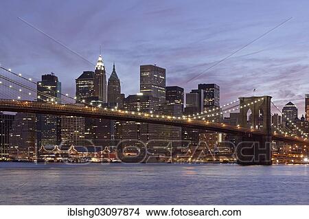 "Brooklyn Bridge in front of the Manhattan skyline in the evening, Manhattan, New York City, New York, United States, North America" View Large Photo Image Picture - "Brooklyn Bridge in front of the Manhattan skyline in the evening, Manhattan, New York City, New York, United States, North America". Fotosearch
