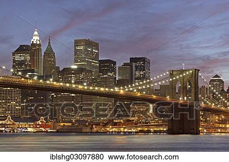 "Brooklyn Bridge in front of the Manhattan skyline in the evening, Manhattan, New York City, New York, United States, North America" View Large Photo Image Stock Image - "Brooklyn Bridge in front of the Manhattan skyline in the evening, Manhattan, New York City, New York, United States, North America". Fotosearch