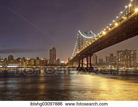 "Brooklyn Bridge in front of the Manhattan skyline in the evening, Manhattan, New York City, New York, United States, North America" View Large Photo Image Stock Photograph - "Brooklyn Bridge in front of the Manhattan skyline in the evening, Manhattan, New York City, New York, United States, North America". Fotosearch