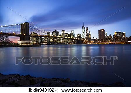 "Brooklyn Bridge, view from Main Street Park over the East River onto the Manhattan skyline, Downtown Brooklyn, Brooklyn, New York" View Large Photo Image Stock Image - "Brooklyn Bridge, view from Main Street Park over the East River onto the Manhattan skyline, Downtown Brooklyn, Brooklyn, New York". Fotosearch