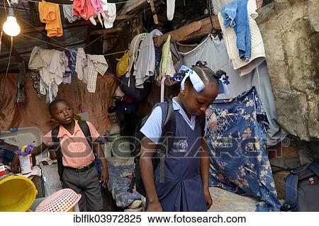 "Brother and sister in school uniforms, Camp Icare for earthquake refugees, Fort National, Port-au-Prince, Haiti, North America" View Large Photo Image Stock Photography - "Brother and sister in school uniforms, Camp Icare for earthquake refugees, Fort National, Port-au-Prince, Haiti, North America". Fotosearch