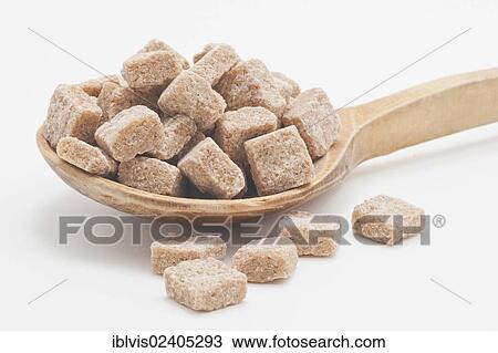 Brown sugar cubes on a wooden spoon View Large Photo Image Stock Image - Brown sugar cubes on a wooden spoon. Fotosearch