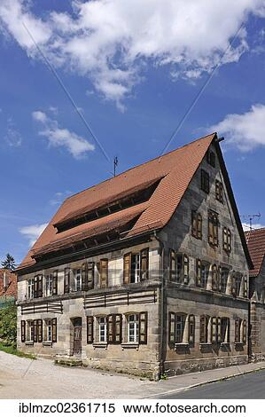 "Brownstone house built in the 18th century, under monumental protection, not yet restored, Bayreuther Strasse street 9, Schnaittach, Middle Franconia, Bavaria, Germany, Europe" View Large Photo Image Stock Photography - "Brownstone house built in the 18th century, under monumental protection, not yet restored, Bayreuther Strasse street 9, Schnaittach, Middle Franconia, Bavaria, Germany, Europe". Fotosearch
