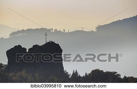 "Bruchhauser Steine rocks with a group of visitors at the summit cross, backlit, Olsberg, Sauerland, North Rhine-Westphalia, Germany, Europe" View Large Photo Image Stock Image - "Bruchhauser Steine rocks with a group of visitors at the summit cross, backlit, Olsberg, Sauerland, North Rhine-Westphalia, Germany, Europe". Fotosearch