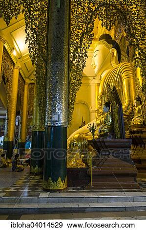 "Buddastatue in the Shwedagon Pagoda, Yangon, Myanmar, Asia" View Large Photo Image Stock Photo - "Buddastatue in the Shwedagon Pagoda, Yangon, Myanmar, Asia". Fotosearch