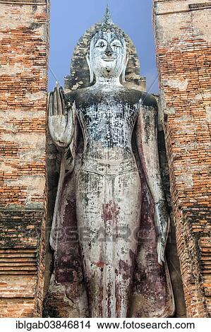 "Buddha statue at the ruins of Wat Phra Si Rattana Mahathat temple complex, Sukhothai Historical Park, UNESCO World Heritage Site, Sukhothai, Thailand, Asia" View Large Photo Image Picture - "Buddha statue at the ruins of Wat Phra Si Rattana Mahathat temple complex, Sukhothai Historical Park, UNESCO World Heritage Site, Sukhothai, Thailand, Asia". Fotosearch