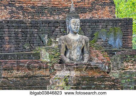 "Buddha statue at the ruins of Wat Phra Si Rattana Mahathat temple complex, Sukhothai Historical Park, UNESCO World Heritage Site, Sukhothai, Thailand, Asia" View Large Photo Image Stock Image - "Buddha statue at the ruins of Wat Phra Si Rattana Mahathat temple complex, Sukhothai Historical Park, UNESCO World Heritage Site, Sukhothai, Thailand, Asia". Fotosearch