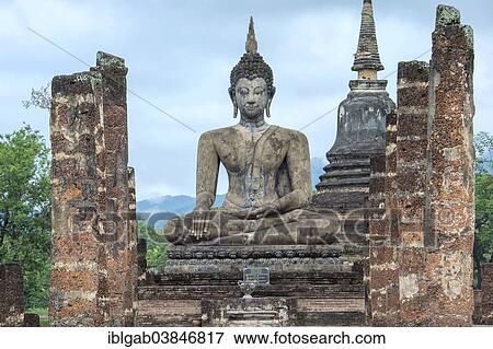 "Buddha statue at the ruins of Wat Phra Si Rattana Mahathat temple complex, Sukhothai Historical Park, UNESCO World Heritage Site, Sukhothai, Thailand, Asia" View Large Photo Image Stock Photo - "Buddha statue at the ruins of Wat Phra Si Rattana Mahathat temple complex, Sukhothai Historical Park, UNESCO World Heritage Site, Sukhothai, Thailand, Asia". Fotosearch