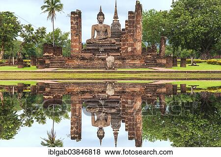 "Buddha statue at the ruins of Wat Phra Si Rattana Mahathat temple complex, Sukhothai Historical Park, UNESCO World Heritage Site, Sukhothai, Thailand, Asia" View Large Photo Image Stock Photo - "Buddha statue at the ruins of Wat Phra Si Rattana Mahathat temple complex, Sukhothai Historical Park, UNESCO World Heritage Site, Sukhothai, Thailand, Asia". Fotosearch