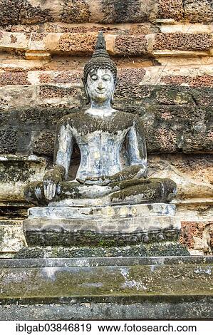 "Buddha statue at the ruins of Wat Phra Si Rattana Mahathat temple complex, Sukhothai Historical Park, UNESCO World Heritage Site, Sukhothai, Thailand, Asia" View Large Photo Image Stock Photo - "Buddha statue at the ruins of Wat Phra Si Rattana Mahathat temple complex, Sukhothai Historical Park, UNESCO World Heritage Site, Sukhothai, Thailand, Asia". Fotosearch