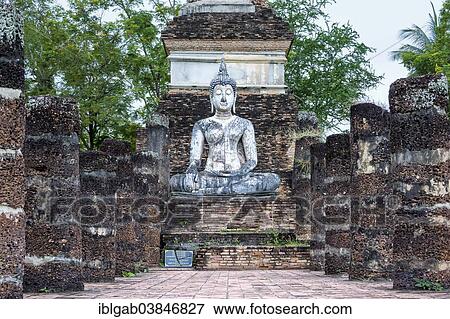 "Buddha statue at the ruins of Wat Phra Si Rattana Mahathat temple complex, Sukhothai Historical Park, UNESCO World Heritage Site, Sukhothai, Thailand, Asia" View Large Photo Image Stock Photo - "Buddha statue at the ruins of Wat Phra Si Rattana Mahathat temple complex, Sukhothai Historical Park, UNESCO World Heritage Site, Sukhothai, Thailand, Asia". Fotosearch