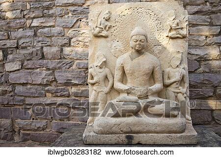 Stock Image - "Buddha statue at the Stupa of Sanchi, Mauryan dynasty, UNESCO World Heritage Site, Sanchi, Madhya Pradesh, India, Asia". Fotosearch