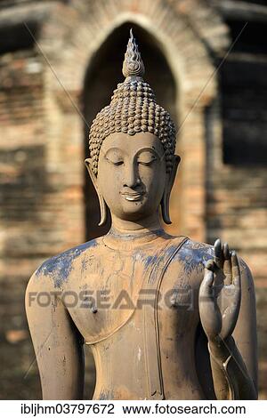 Stock Image - "Buddha statue, detail, Wat Sa Si or War Sra Sri, Sukhothai Historical Park, Sukhothai, Northern Thailand, Thailand, Asia". Fotosearch