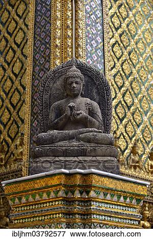 Stock Photo - "Buddha statue in front of the Mondop, a library, Wat Phra Kaeo Temple, Grand Palace, Bangkok, Thailand, Asia". Fotosearch