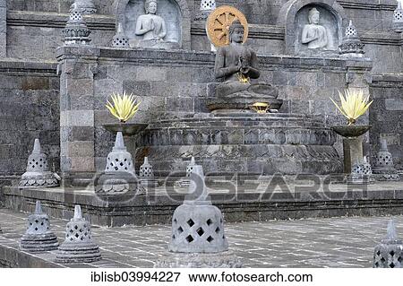 "Buddha statue on an altar outside of the Buddhist Brahma Vihara Monastery, Banjar, North Bali, Bali, Indonesia, Asia" View Large Photo Image Stock Photo - "Buddha statue on an altar outside of the Buddhist Brahma Vihara Monastery, Banjar, North Bali, Bali, Indonesia, Asia". Fotosearch