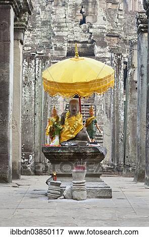 "Buddha statue on the western side of the Bayon temple, Angkor Thom, Angkor, Siem Reap, Cambodia, Asia" View Large Photo Image Stock Photo - "Buddha statue on the western side of the Bayon temple, Angkor Thom, Angkor, Siem Reap, Cambodia, Asia". Fotosearch