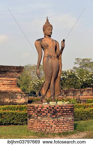 "Buddha statue, standing or walking, Wat Sa Si or Wat Sra Sri, Sukhothai Historical Park, Sukhothai, Northern Thailand, Thailand, Asia" View Large Photo Image Stock Photo - "Buddha statue, standing or walking, Wat Sa Si or Wat Sra Sri, Sukhothai Historical Park, Sukhothai, Northern Thailand, Thailand, Asia". Fotosearch