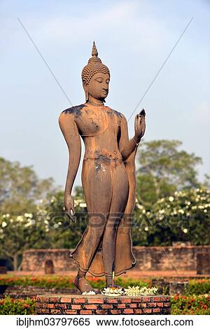 "Buddha statue, standing or walking, Wat Sa Si or Wat Sra Sri, Sukhothai Historical Park, Sukhothai, Northern Thailand, Thailand, Asia" View Large Photo Image Stock Photography - "Buddha statue, standing or walking, Wat Sa Si or Wat Sra Sri, Sukhothai Historical Park, Sukhothai, Northern Thailand, Thailand, Asia". Fotosearch