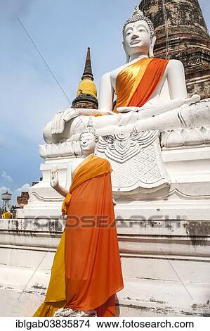 "Buddha statues in front of the stupa at Wat Yai Chai Mongkhon, Ayutthaya, Thailand, Asia" View Large Photo Image Picture - "Buddha statues in front of the stupa at Wat Yai Chai Mongkhon, Ayutthaya, Thailand, Asia". Fotosearch