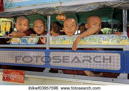 "Buddhist child monks taking the school bus, Bagan, Mandalay Division, Myanmar, Asia" View Large Photo Image Stock Photograph - "Buddhist child monks taking the school bus, Bagan, Mandalay Division, Myanmar, Asia". Fotosearch