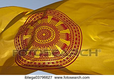 Stock Photo - "Buddhist flag with the Dharmacakra wheel symbolizing the Buddha's teachings, Thailand, Asia". Fotosearch