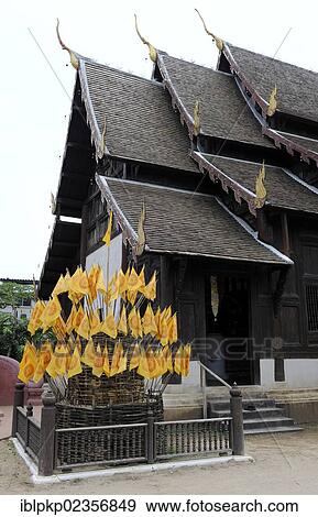 Stock Photo - "Buddhist flags in front of the Wat Chedi Luang Temple in Chiang Mai, Thailand, Asia". Fotosearch