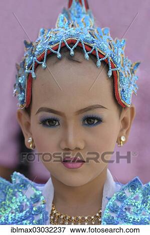"Buddhist girl dressed up to celebrate the novitiation ceremony, Mahamuni Pagoda, Mandalay, Mandalay, Myanmar, Burma, Asia" View Large Photo Image Stock Photo - "Buddhist girl dressed up to celebrate the novitiation ceremony, Mahamuni Pagoda, Mandalay, Mandalay, Myanmar, Burma, Asia". Fotosearch
