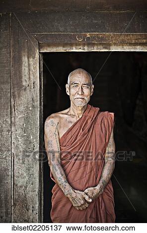 "Buddhist monk at a monastery in Burma, Myanmar, Southeast Asia, Asia" View Large Photo Image Stock Photo - "Buddhist monk at a monastery in Burma, Myanmar, Southeast Asia, Asia". Fotosearch