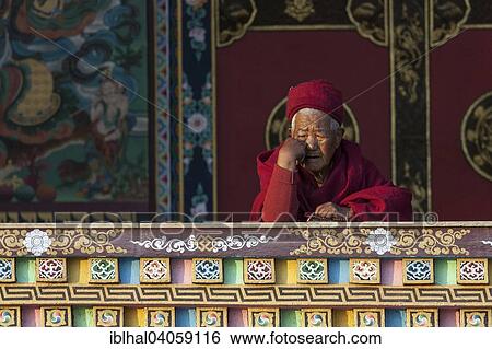 "Buddhist monk on the balcony of the Cinya Llama Gompa, Boudhanath, UNESC World Heritage Site, Kathmandu, Nepal, Asia" View Large Photo Image Stock Photograph - "Buddhist monk on the balcony of the Cinya Llama Gompa, Boudhanath, UNESC World Heritage Site, Kathmandu, Nepal, Asia". Fotosearch
