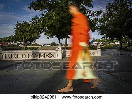 "Buddhist monk walking in the streets of Bangkok, Thailand, Asia" View Large Photo Image Stock Image - "Buddhist monk walking in the streets of Bangkok, Thailand, Asia". Fotosearch