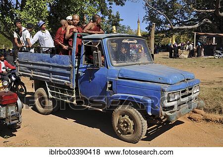 "Buddhist monks and villagers on the way home from the Full Moon Festival in December, Nyaung Shwe, Shan State, Myanmar, Burma, Asia" View Large Photo Image Stock Photo - "Buddhist monks and villagers on the way home from the Full Moon Festival in December, Nyaung Shwe, Shan State, Myanmar, Burma, Asia". Fotosearch