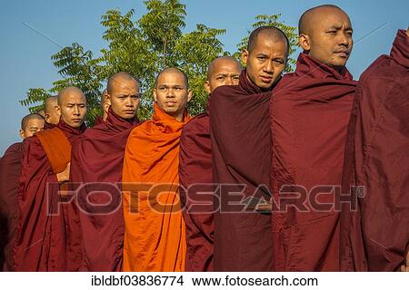 "Buddhist monks collecting alms at the temple, Bagan, Mandalay Region, Myanmar, Asia" View Large Photo Image Picture - "Buddhist monks collecting alms at the temple, Bagan, Mandalay Region, Myanmar, Asia". Fotosearch