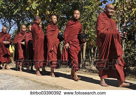 "Buddhist monks collecting alms, Full Moon Festival in December, Nyaung Shwe, Shan State, Myanmar, Burma, Asia" View Large Photo Image Stock Image - "Buddhist monks collecting alms, Full Moon Festival in December, Nyaung Shwe, Shan State, Myanmar, Burma, Asia". Fotosearch