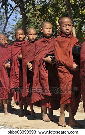 "Buddhist monks collecting alms in, Full Moon Festival in December, Nyaung Shwe, Shan State, Myanmar, Burma, Asia" View Large Photo Image Stock Image - "Buddhist monks collecting alms in, Full Moon Festival in December, Nyaung Shwe, Shan State, Myanmar, Burma, Asia". Fotosearch