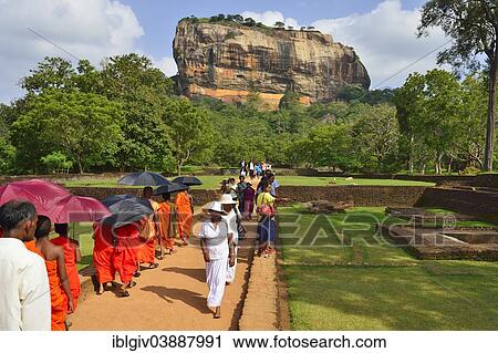 "Buddhist monks on their way to the Lion Rock, Sigiriya, UNESCO World Heritage Site, Sigiriya, Central Province, Sri Lanka, Asia" View Large Photo Image Stock Image - "Buddhist monks on their way to the Lion Rock, Sigiriya, UNESCO World Heritage Site, Sigiriya, Central Province, Sri Lanka, Asia". Fotosearch
