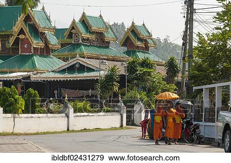"Buddhist monks with parasols, Temple complex of Wat Jong Kham and Chong Kham, Mae Hong Son, Northern Thailand, Thailand, Asia" View Large Photo Image Stock Photo - "Buddhist monks with parasols, Temple complex of Wat Jong Kham and Chong Kham, Mae Hong Son, Northern Thailand, Thailand, Asia". Fotosearch