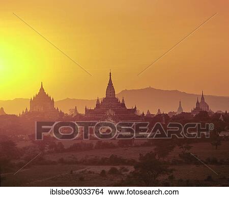 "Buddhist pagodas, Thatbyinnyu Temple, left, Ananda Temple, centre, at sunset, Ebene von Pagan, Bagan, Mandalay Division, Myanmar, Burma, Asia" View Large Photo Image Picture - "Buddhist pagodas, Thatbyinnyu Temple, left, Ananda Temple, centre, at sunset, Ebene von Pagan, Bagan, Mandalay Division, Myanmar, Burma, Asia". Fotosearch