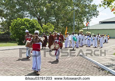 "Buddhist pilgrims in a procession with music, Anuradhapura, North Central Province, Sri Lanka, Asia" View Large Photo Image Stock Image - "Buddhist pilgrims in a procession with music, Anuradhapura, North Central Province, Sri Lanka, Asia". Fotosearch