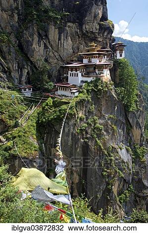 "Buddhist prayer flags fluttering at the Tiger's Nest Monastery, Taktsang Monastery, Paro district, Bhutan, Asia" View Large Photo Image Stock Image - "Buddhist prayer flags fluttering at the Tiger's Nest Monastery, Taktsang Monastery, Paro district, Bhutan, Asia". Fotosearch