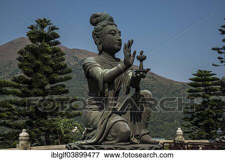"Buddhist statue praising Tian Tan Buddha or the Big Buddha, Lantau Island, Hong Kong, China, Asia" View Large Photo Image Stock Photo - "Buddhist statue praising Tian Tan Buddha or the Big Buddha, Lantau Island, Hong Kong, China, Asia". Fotosearch