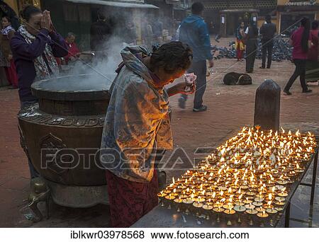 "Buddhists in prayer at dawn, Boudhanath, Kathmandu, Nepal, Asia" View Large Photo Image Stock Photo - "Buddhists in prayer at dawn, Boudhanath, Kathmandu, Nepal, Asia". Fotosearch