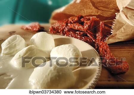 Bufallo mozzarella and sun-dried tomatoes View Large Photo Image Stock Image - Bufallo mozzarella and sun-dried tomatoes. Fotosearch