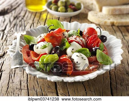 Stock Photo - Buffalo mozarella and tomato salad. Fotosearch