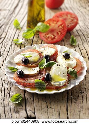 Buffalo mozzarella and tomato salad View Large Photo Image Stock Photo - Buffalo mozzarella and tomato salad. Fotosearch