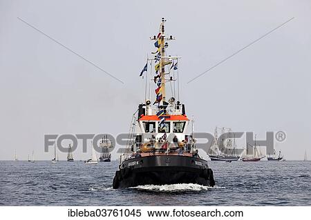 "BUGSIER 16 at the Hanse Sail 2013, Baltic Sea near the entrance to the port, Warnemunde, Rostock, Mecklenburg-Western Pomerania, Germany, Europe" View Large Photo Image Stock Photography - "BUGSIER 16 at the Hanse Sail 2013, Baltic Sea near the entrance to the port, Warnemunde, Rostock, Mecklenburg-Western Pomerania, Germany, Europe". Fotosearch
